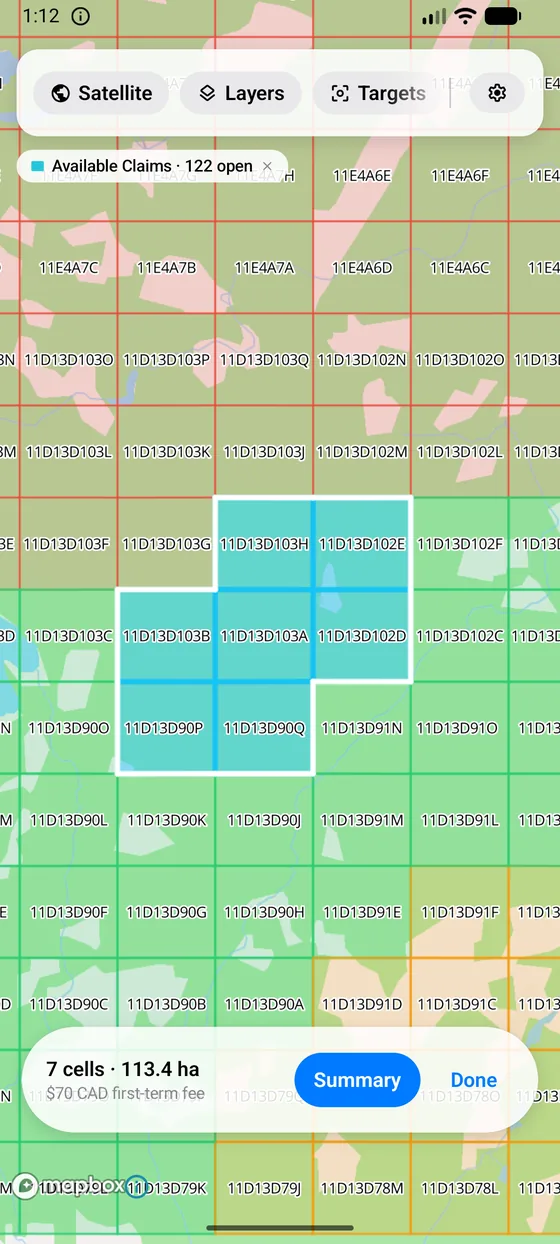 The staking calculator with seven coterminous cells selected, showing 113.4 hectares and a $70 first-term fee.